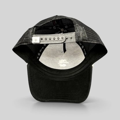 Raree Finds black trucker hat from the Discovery Collection with a breathable mesh back and adjustable snapback closure