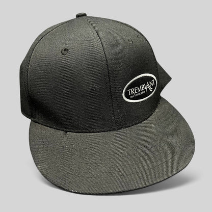 Raree Finds black Fits snapback hat featuring an embroidered white oval Mont Tremblant ski resort logo on the front.