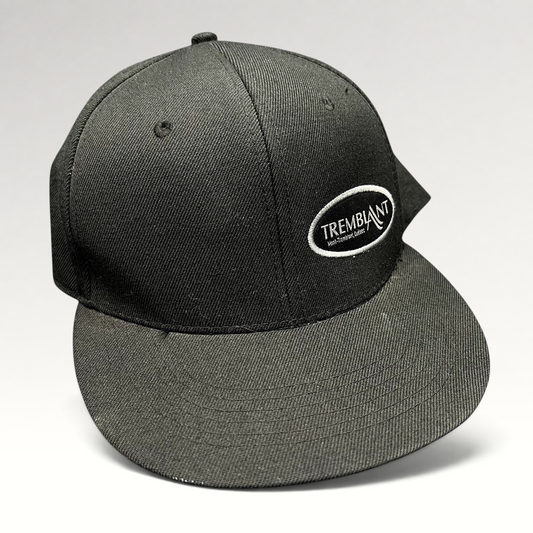 Raree Finds black Fits snapback hat featuring an embroidered white oval Mont Tremblant ski resort logo on the front.