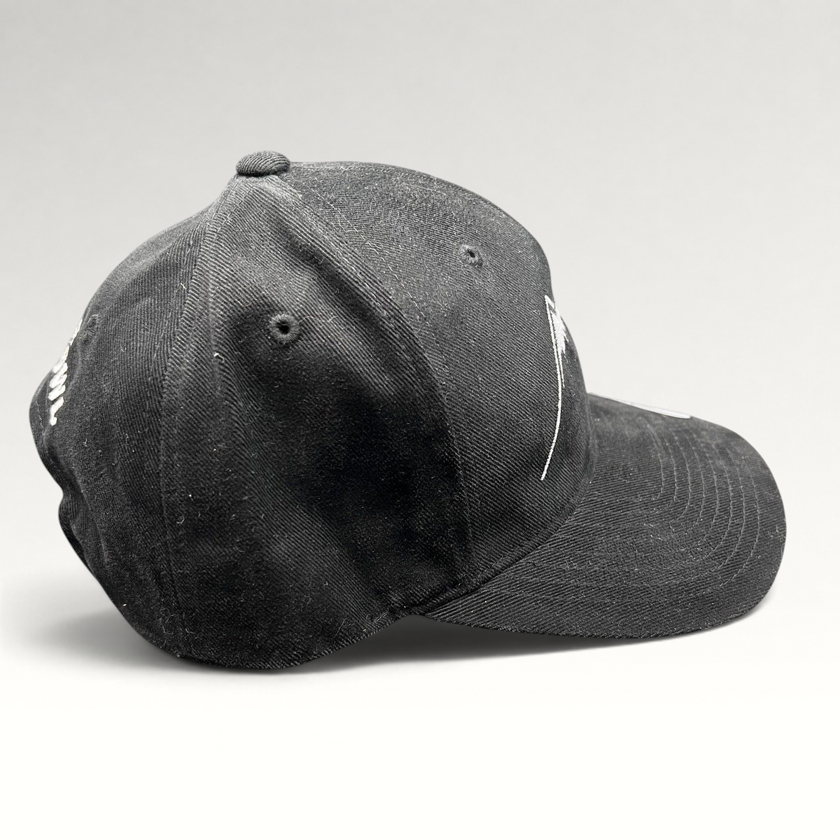 Raree Finds black Yupoong strapback hat with white Humphreys Peak mountain embroidery and curved brim