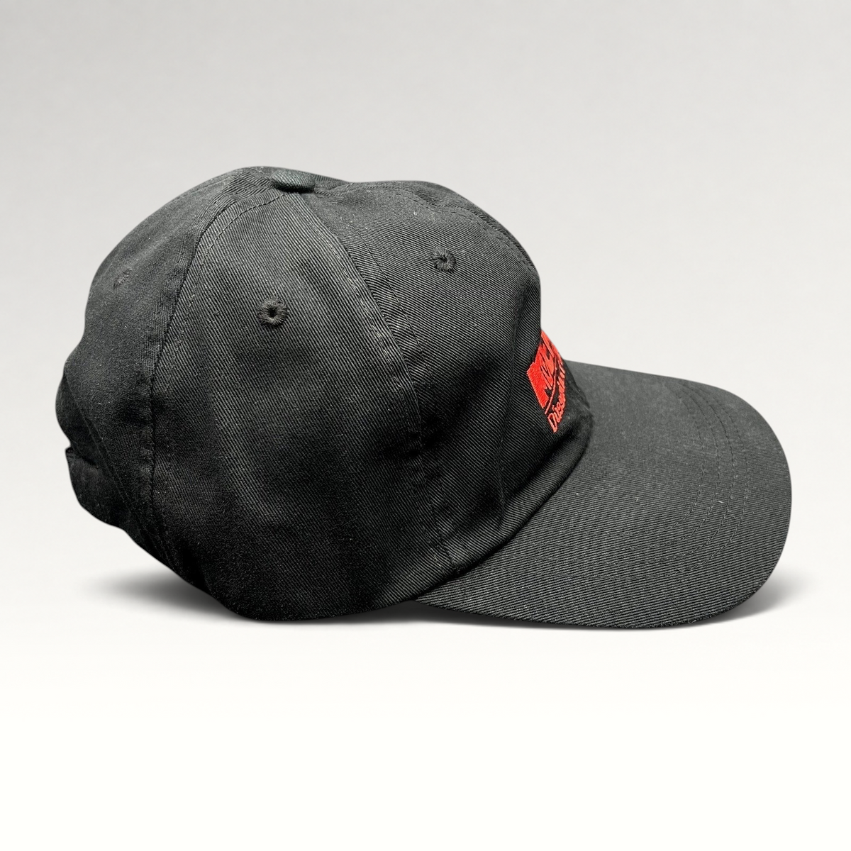 Raree Finds black six-panel strapback hat with red embroidered MTV EMA Düsseldorf 2022 logo on the front