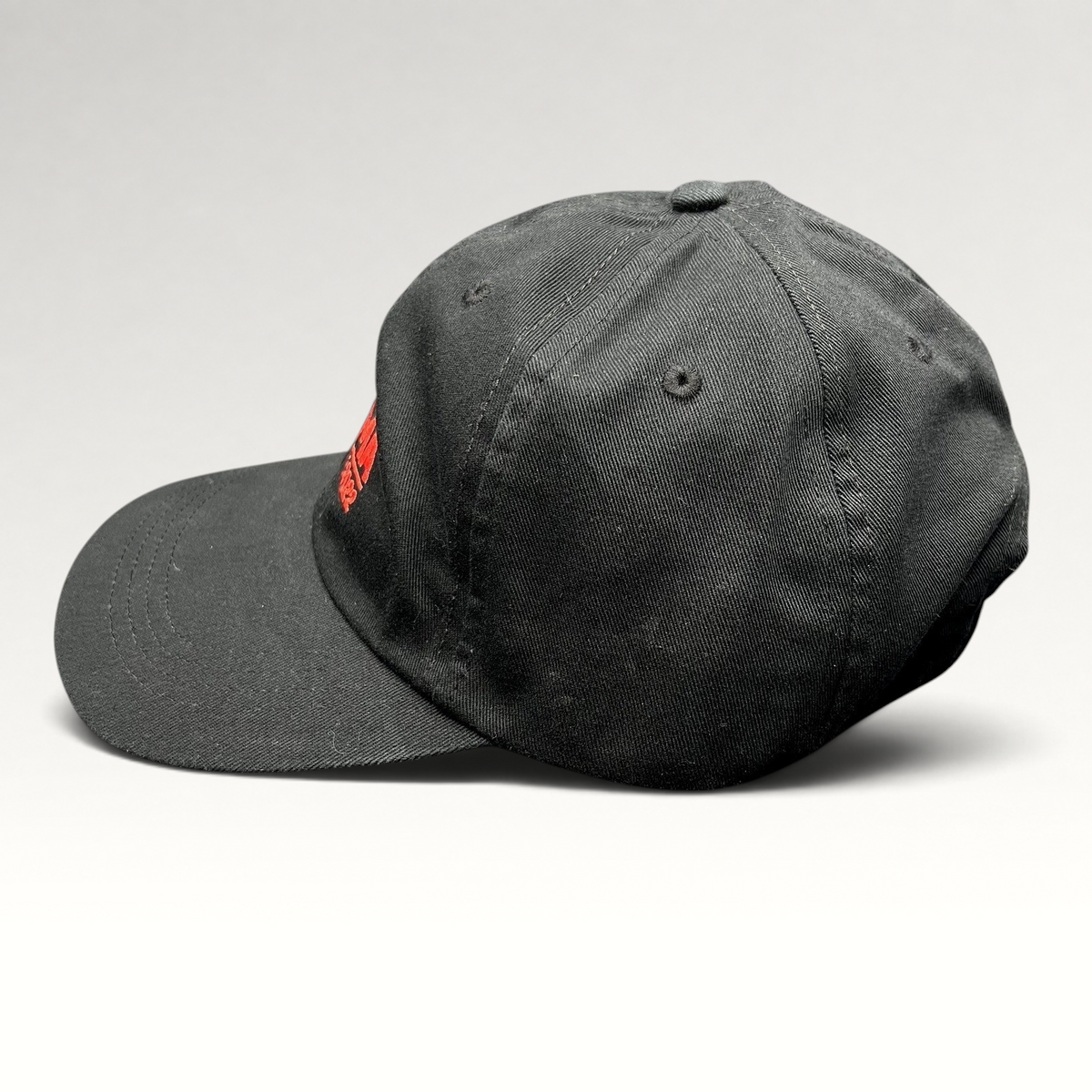 Raree Finds black Beechfield strapback hat with red embroidered MTV EMA Düsseldorf 2022 logo on the front
