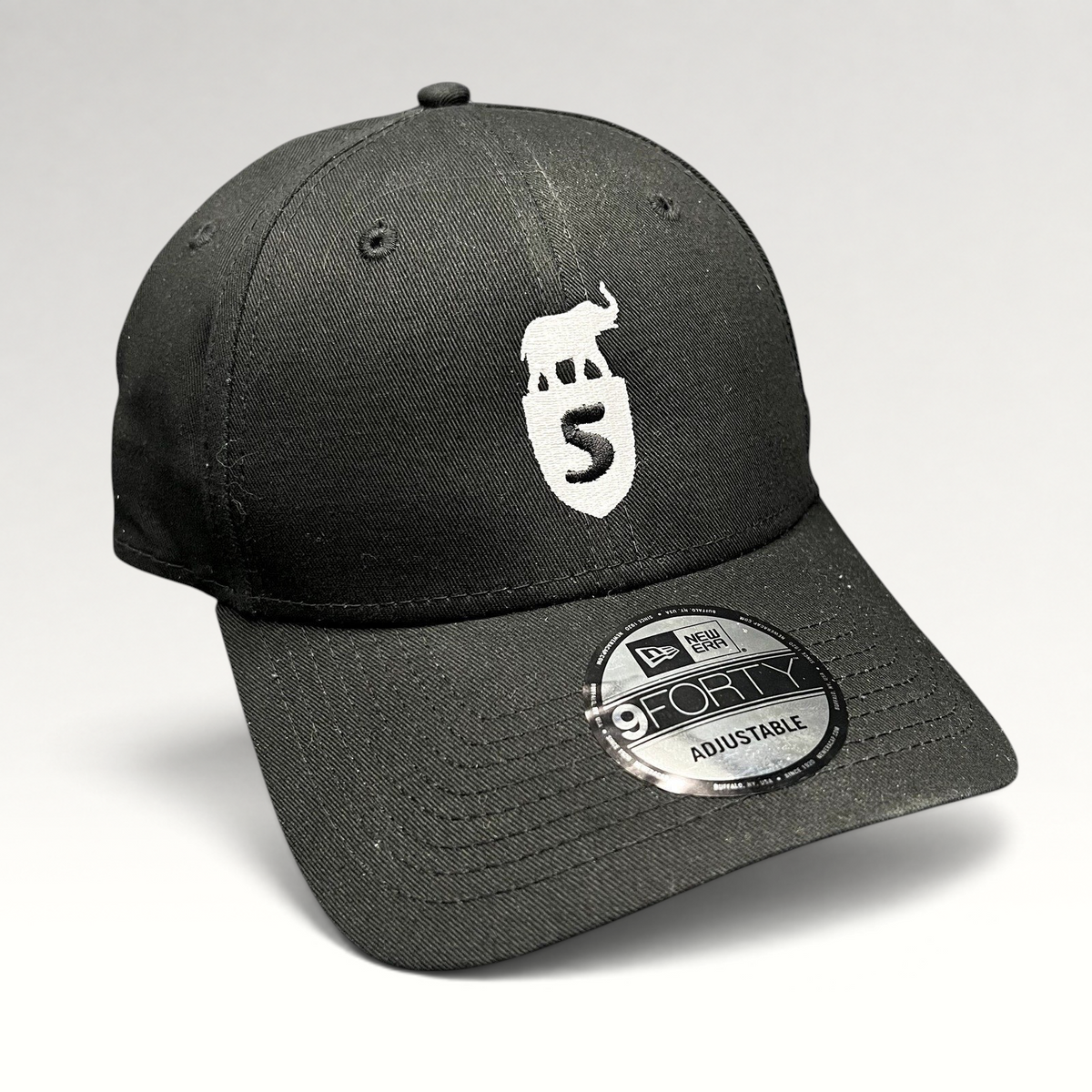 Raree Finds black New Era 9FORTY strapback hat featuring a white embroidered Five Park Miami Beach elephant crest logo