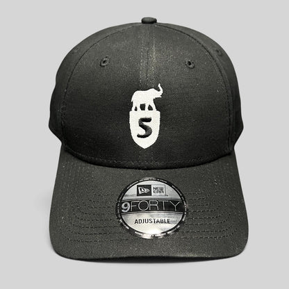 Raree Finds black New Era 9FORTY strapback hat with white embroidered elephant and shield crest logo on front