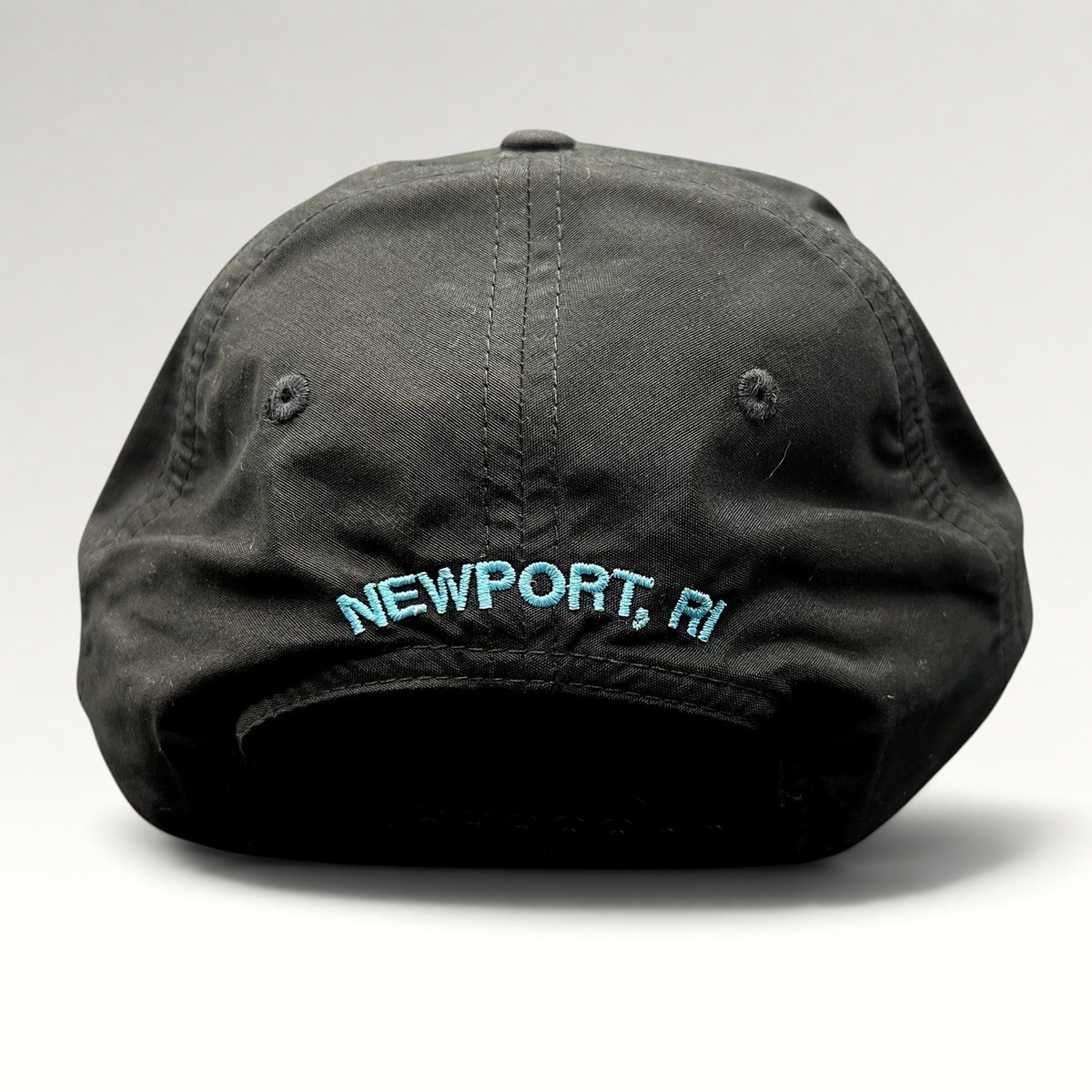 Raree Finds black Richardson Outdoor snapback hat with aqua blue Newport RI embroidery on the back