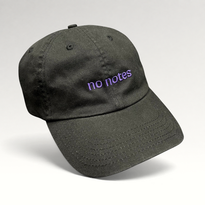 Raree Finds black cotton twill dad hat with purple embroidered no notes text on the front