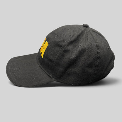 Raree Finds black strapback hat with yellow embroidered NRA logo and curved brim in a classic 6-panel design
