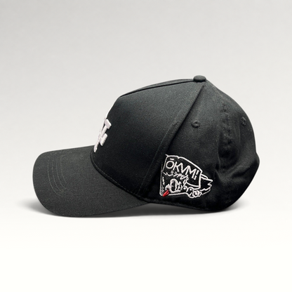 Raree Finds black Okami Brand strapback hat with white LV embroidery and side wolf graphic patch
