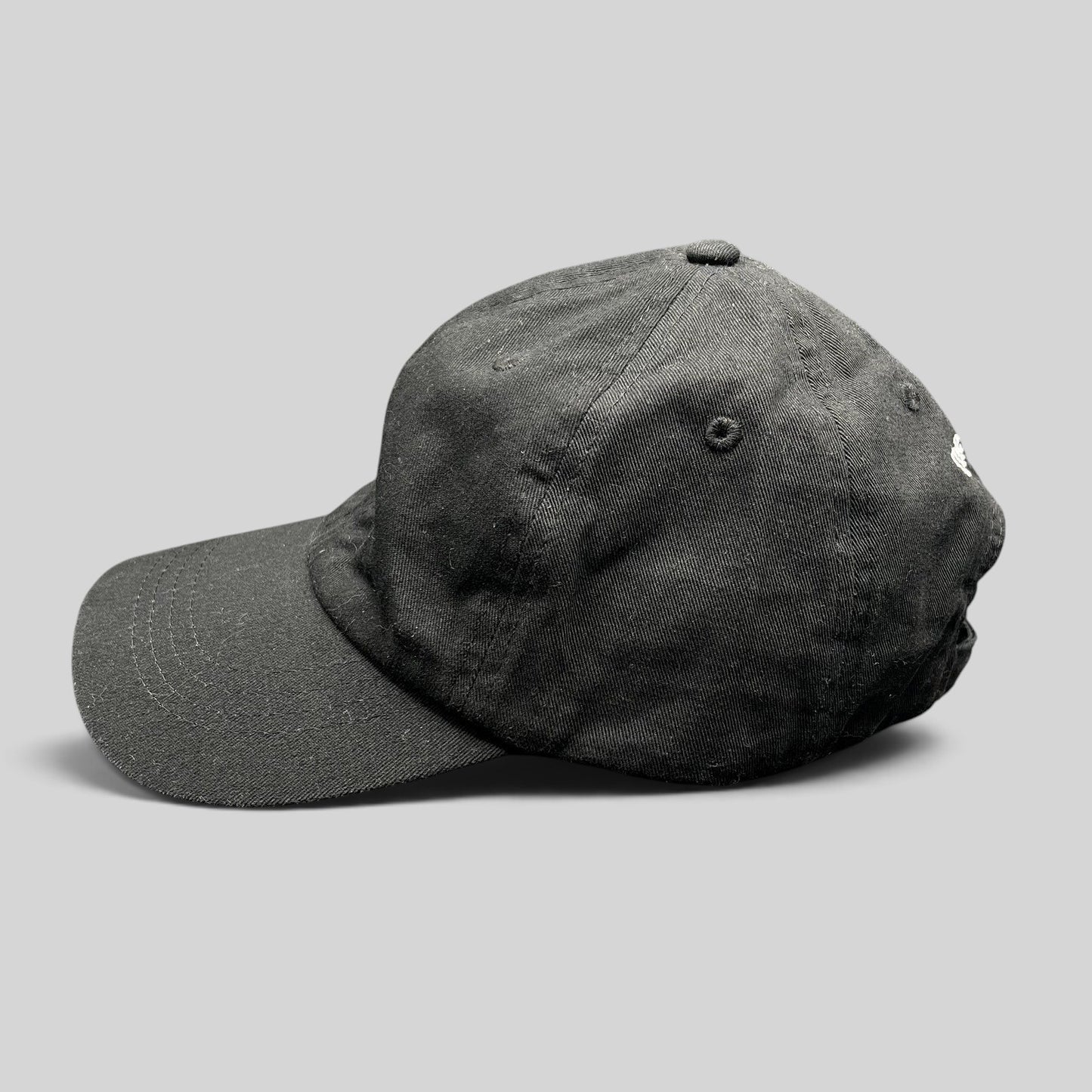Raree Finds black organic cotton dad cap with a low-profile unstructured crown and curved brim