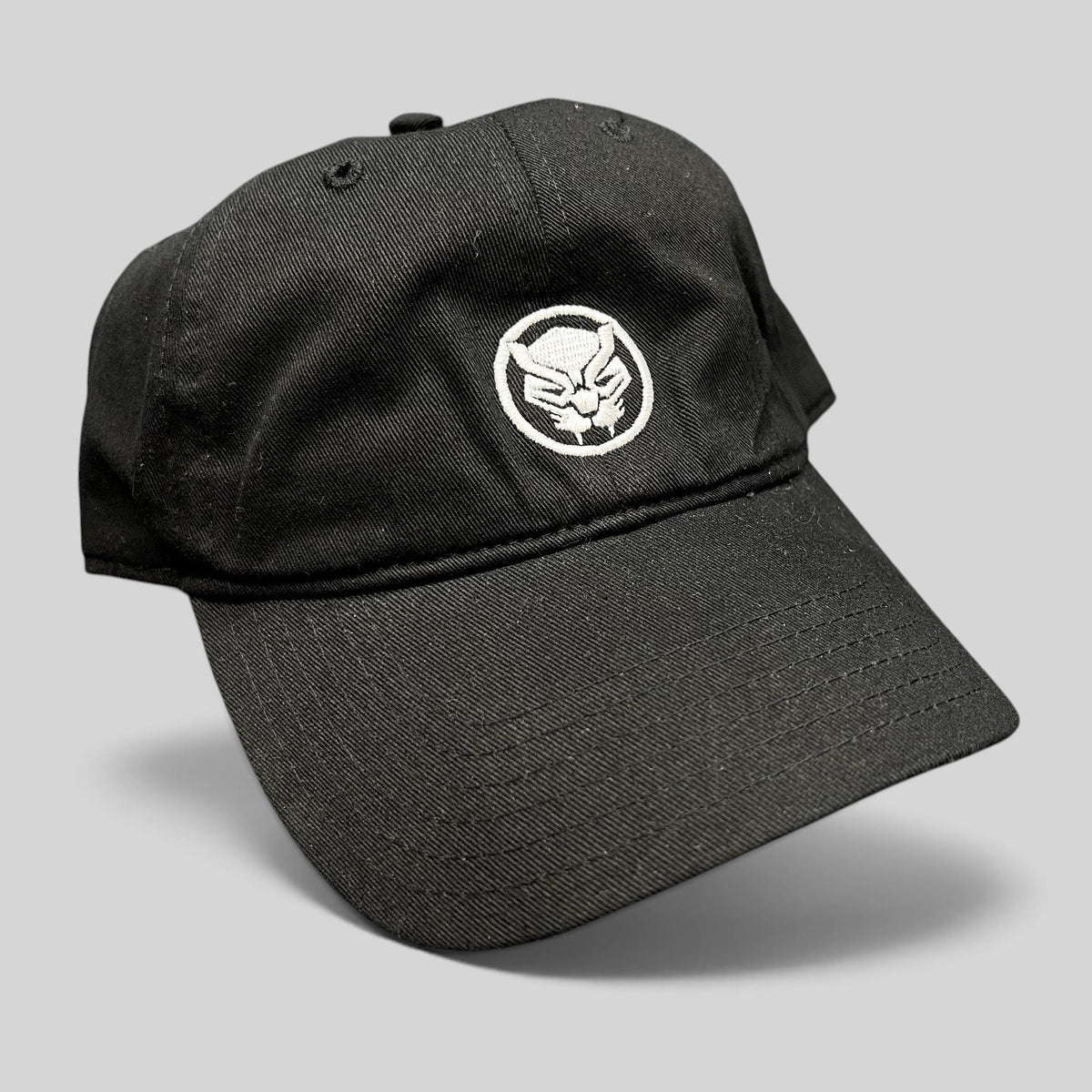 Raree Finds official Marvel Black Panther black strapback hat with an embroidered mask logo on the front