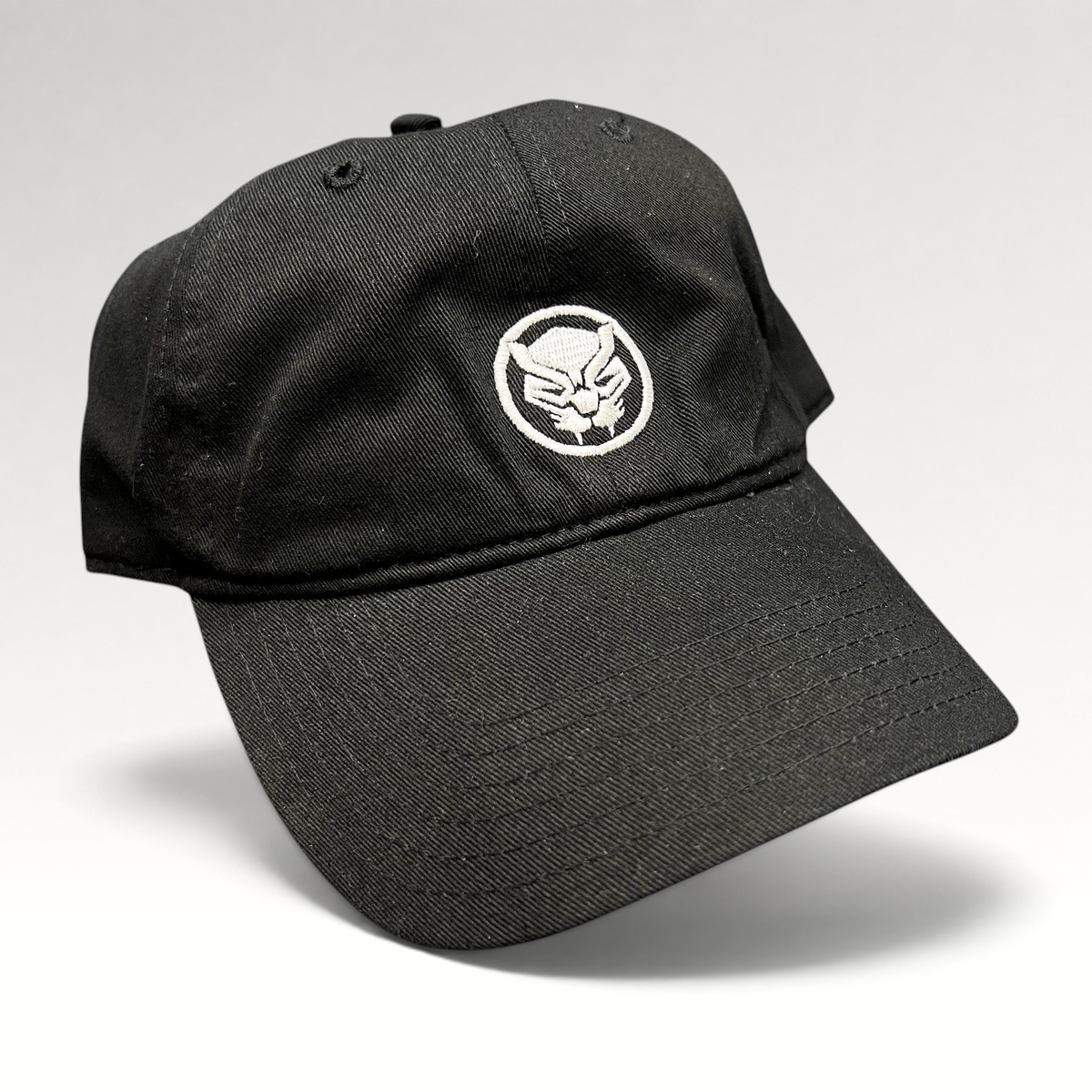 Raree Finds official Marvel Black Panther black strapback hat with an embroidered mask logo on the front