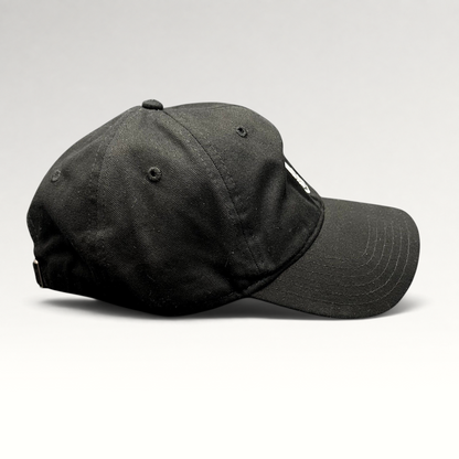 Raree Finds black Marvel Black Panther strapback hat with embroidered mask logo, side profile view.