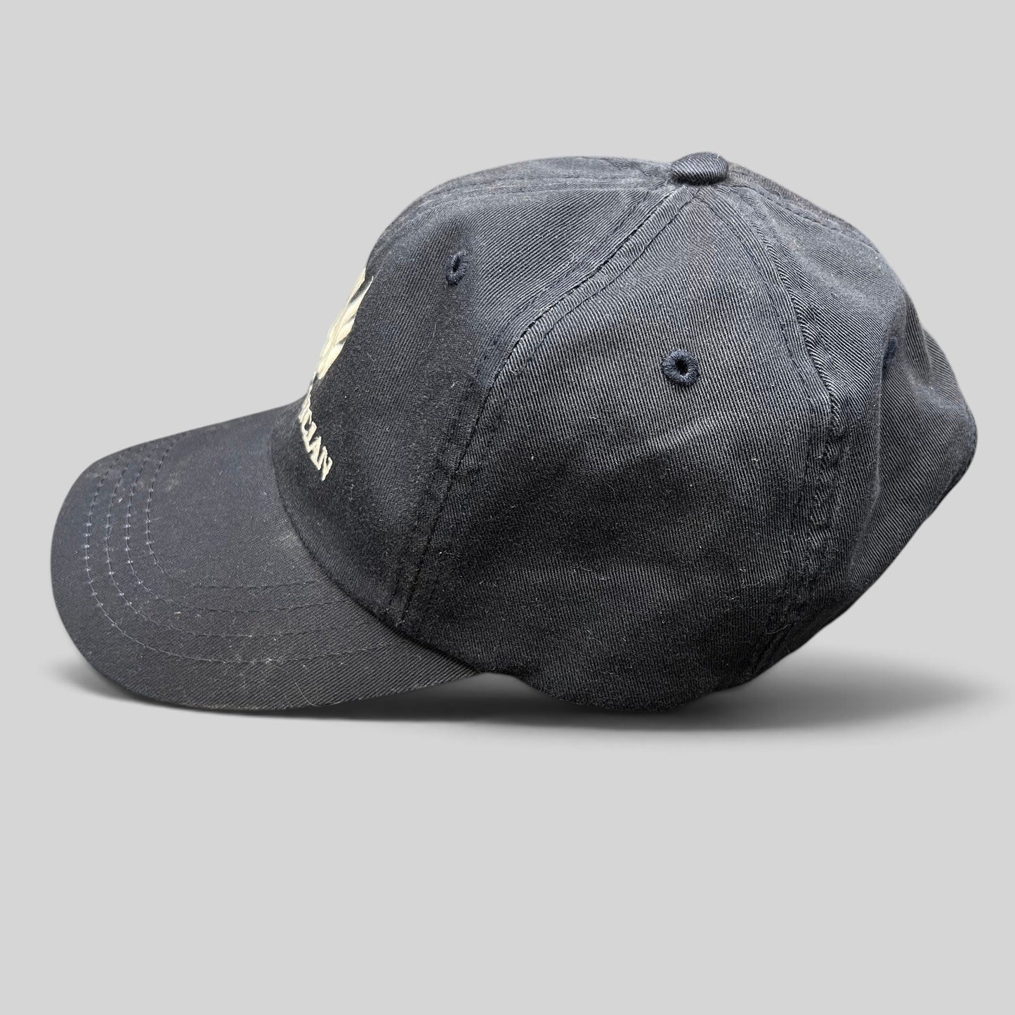 Raree Finds black cotton strapback dad cap with embroidered The Phoenician Scottsdale golf club logo and curved brim