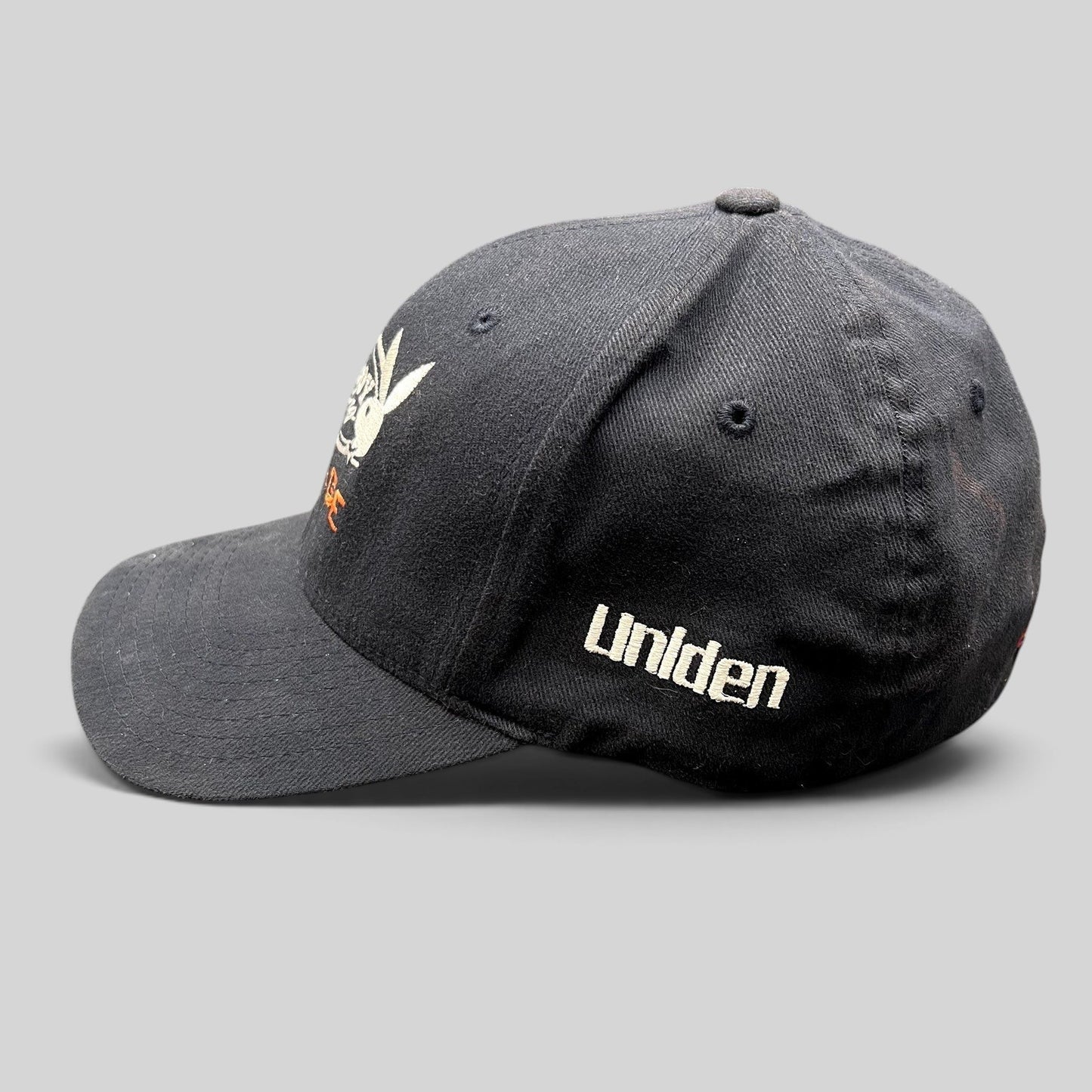 Raree Finds black Playboy Racing Flexfit cap with Uniden side embroidery and structured stretch-fit design