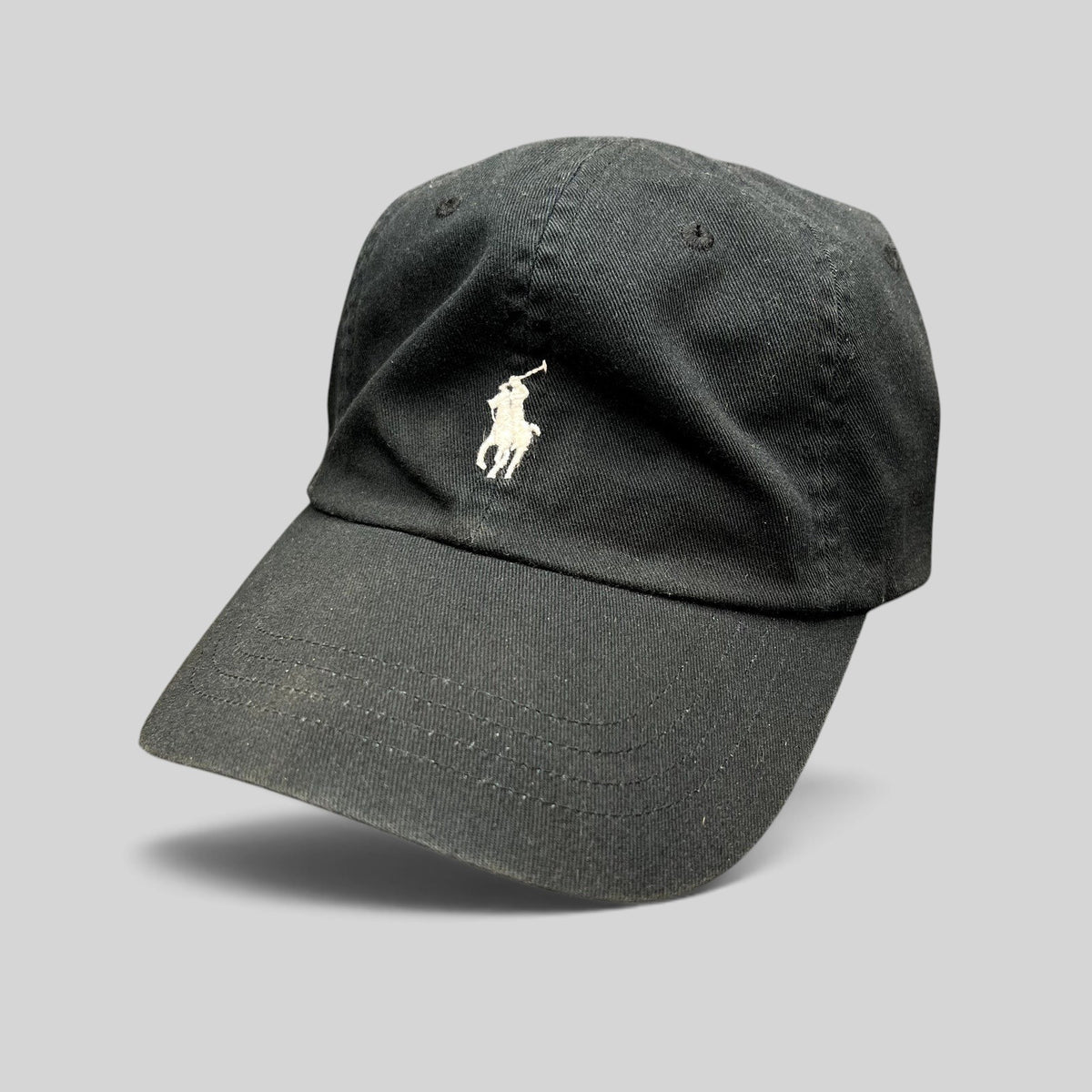 Raree Finds black cotton twill Polo Ralph Lauren strapback hat with a white embroidered pony logo on the front