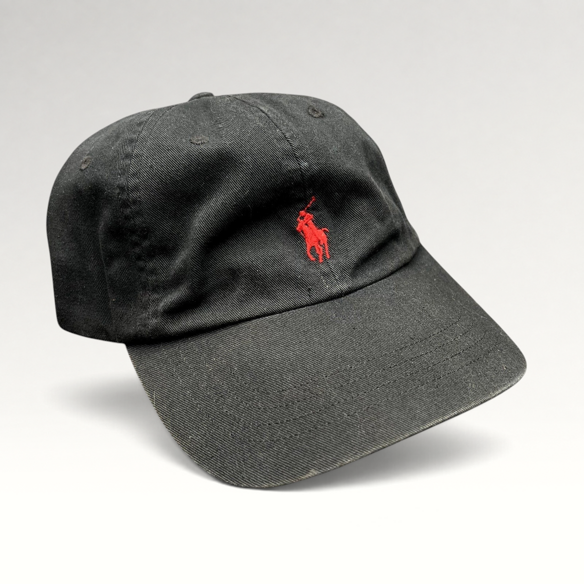 Raree Finds black Polo Ralph Lauren cotton strapback hat with a red embroidered pony logo on the front