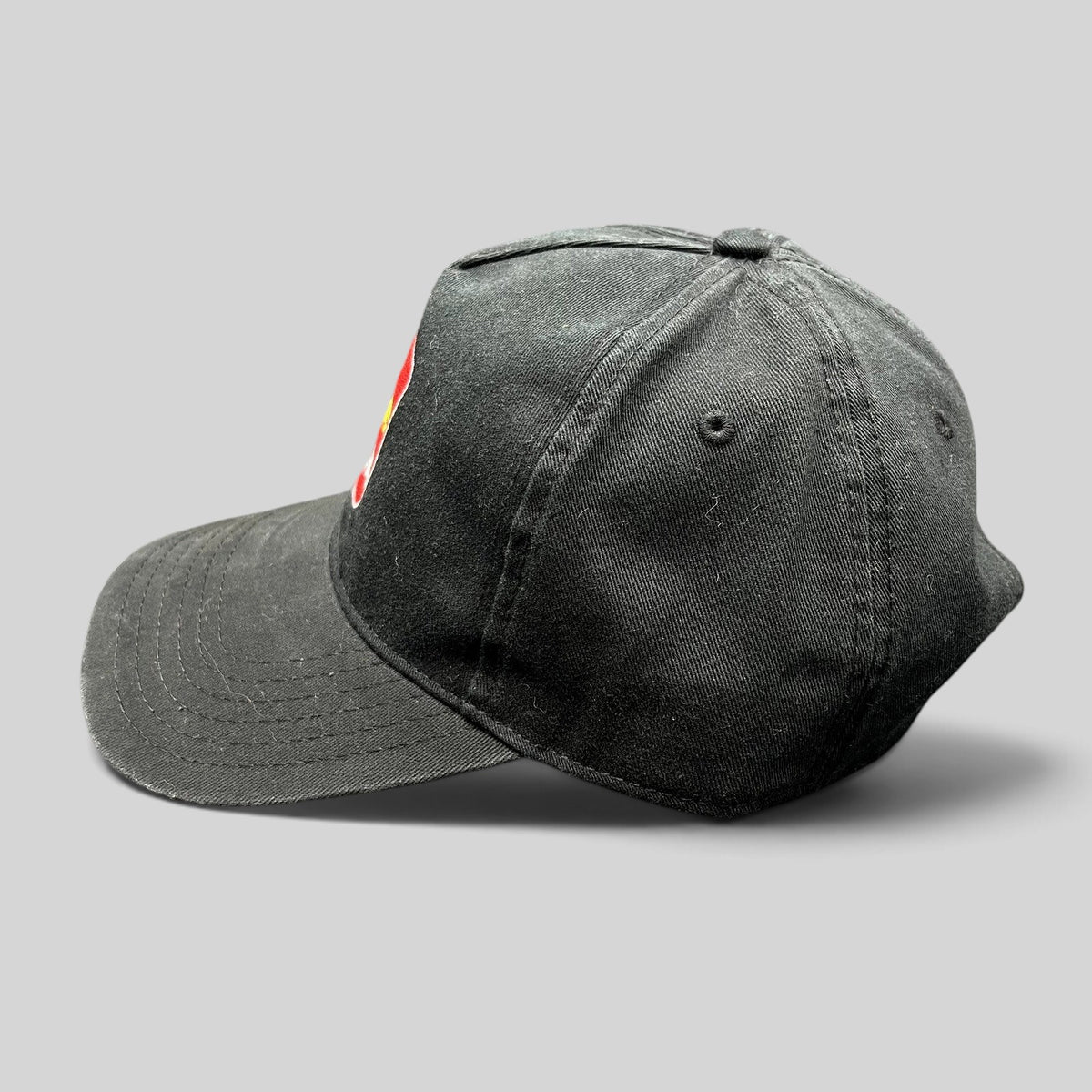Raree Finds black cotton strapback hat with The Price Is Right embroidered logo and curved brim