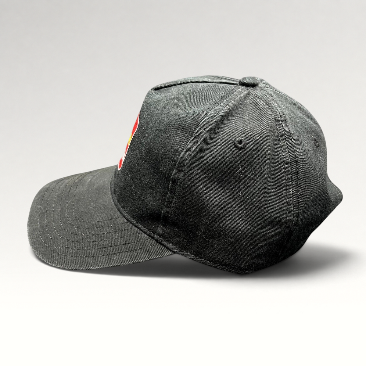 Raree Finds black cotton strapback hat with The Price Is Right embroidered logo and curved brim
