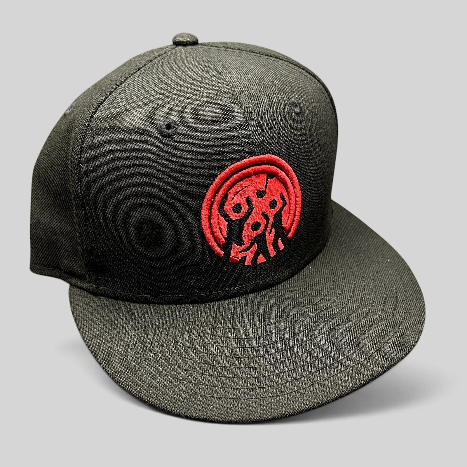 Raree Finds black New Era 9FIFTY snapback hat with a red embroidered Background Vibez logo on the front