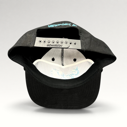 Raree Finds black Richardson Outdoor snapback hat showing the interior with Newport RI embroidery on the back strap