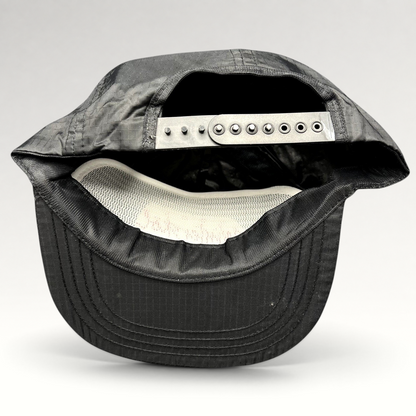 Raree Finds vintage black ripstop nylon snapback hat with adjustable closure and white interior mesh lining