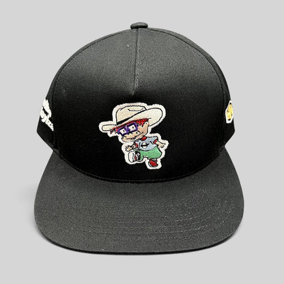 Raree Finds black Yupoong snapback hat with Rugrats-style embroidered character and flat brim design.