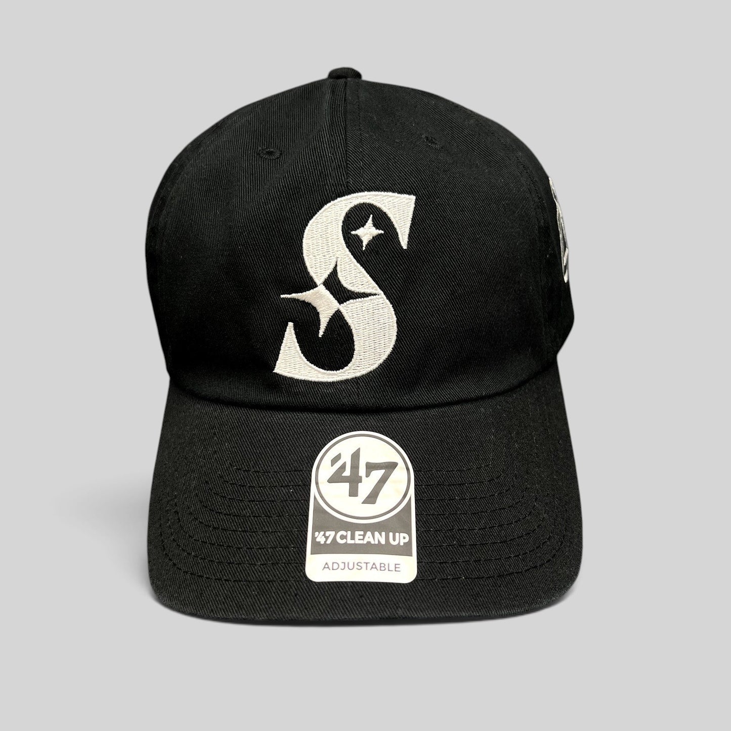 Raree Finds 47 Brand black cotton strapback hat with a white embroidered S logo and curved brim
