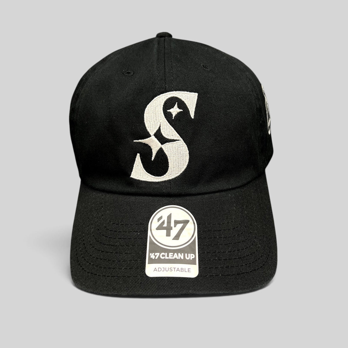 Raree Finds 47 Brand black cotton strapback hat with a white embroidered S logo and curved brim