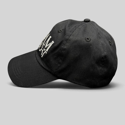 Raree Finds black cotton snapback hat with silver sequin Adam Lambert logo, side profile view.