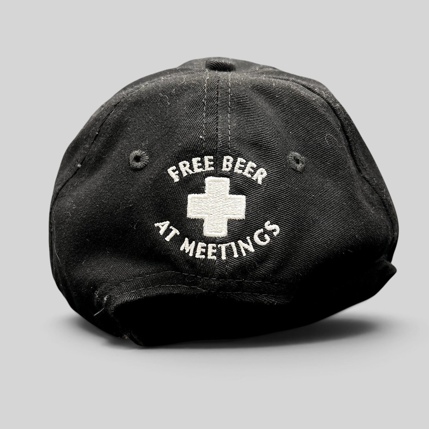 Raree Finds vintage black cotton strapback hat with white embroidered ASPA ski patrol cross and Free Beer text