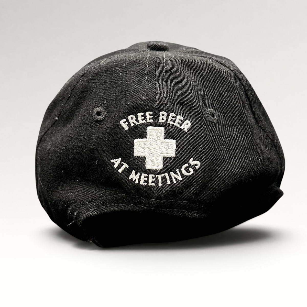 Raree Finds vintage black cotton strapback hat with white embroidered ASPA ski patrol cross and Free Beer text