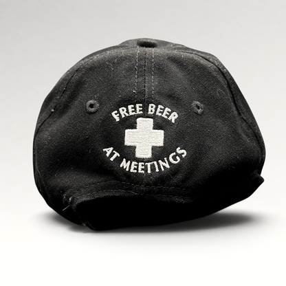Raree Finds vintage black cotton strapback hat with white embroidered ASPA ski patrol cross and Free Beer text