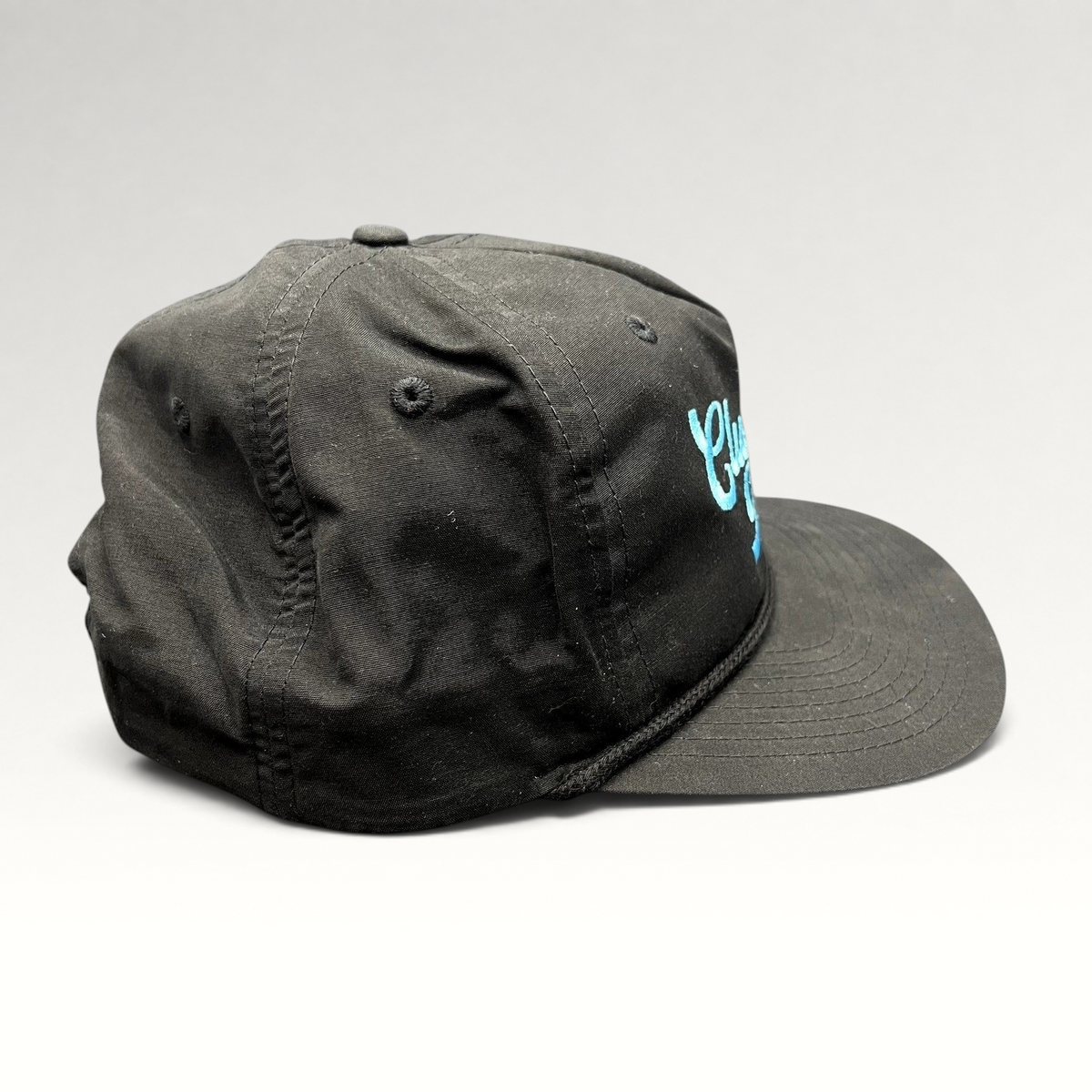 Raree Finds black Richardson Outdoor snapback hat with aqua blue Cluck House script embroidery and front rope detail.