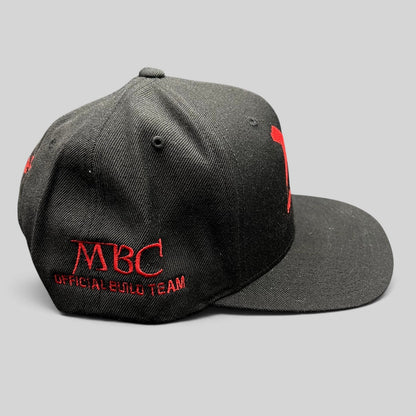 Raree Finds black snapback hat with red MBC Official Build Team embroidery on the side panel
