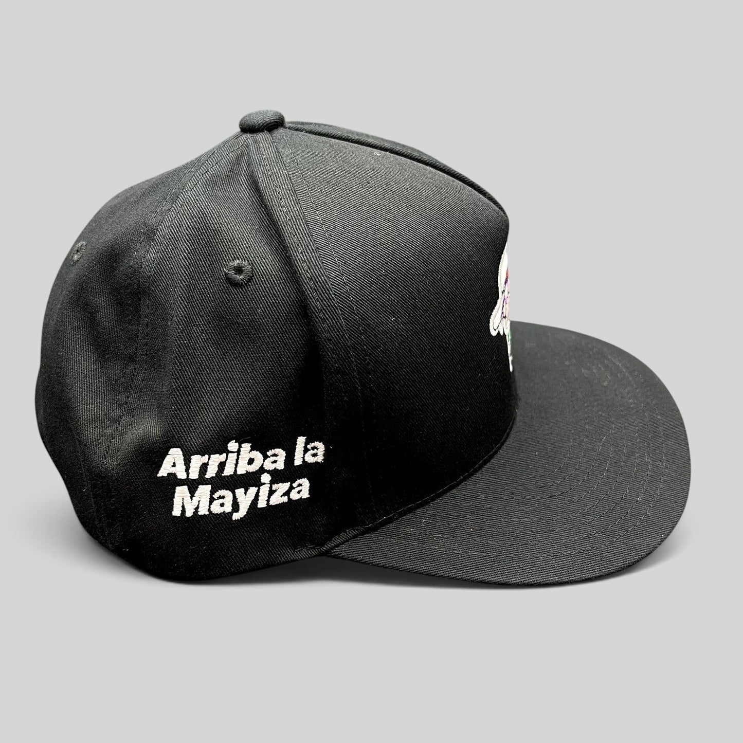 Raree Finds black Yupoong cotton snapback hat with Arriba la Mayiza side embroidery and flat brim design