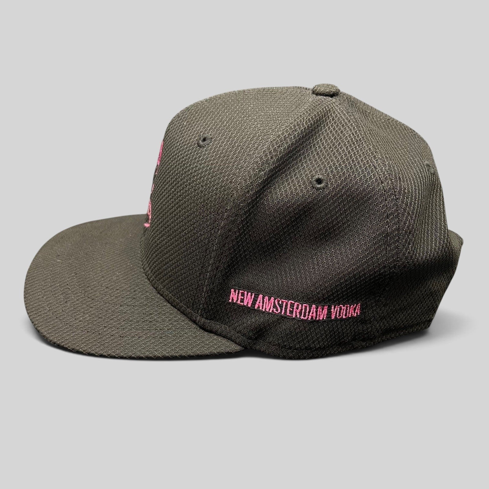 Raree Finds black New Era 9FIFTY snapback hat with pink New Amsterdam Vodka embroidery on the side