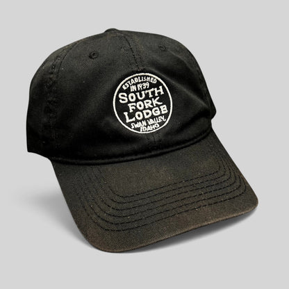 Raree Finds black cotton strapback hat with white embroidered South Fork Lodge Swan Valley Idaho logo