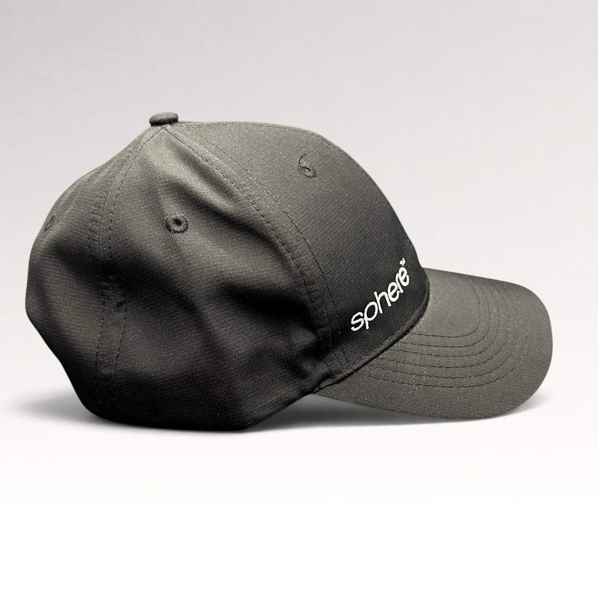 Raree Finds black strapback hat with white Sphere logo embroidery and curved brim in an unstructured profile.