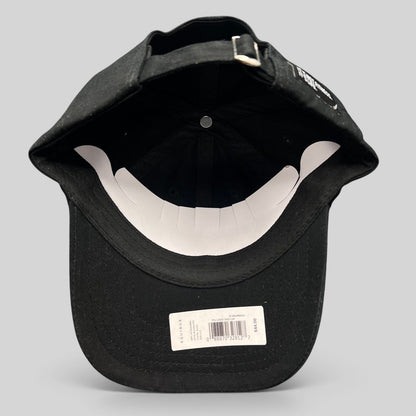 Raree Finds black cotton blend strapback cap with adjustable metal buckle closure, interior view