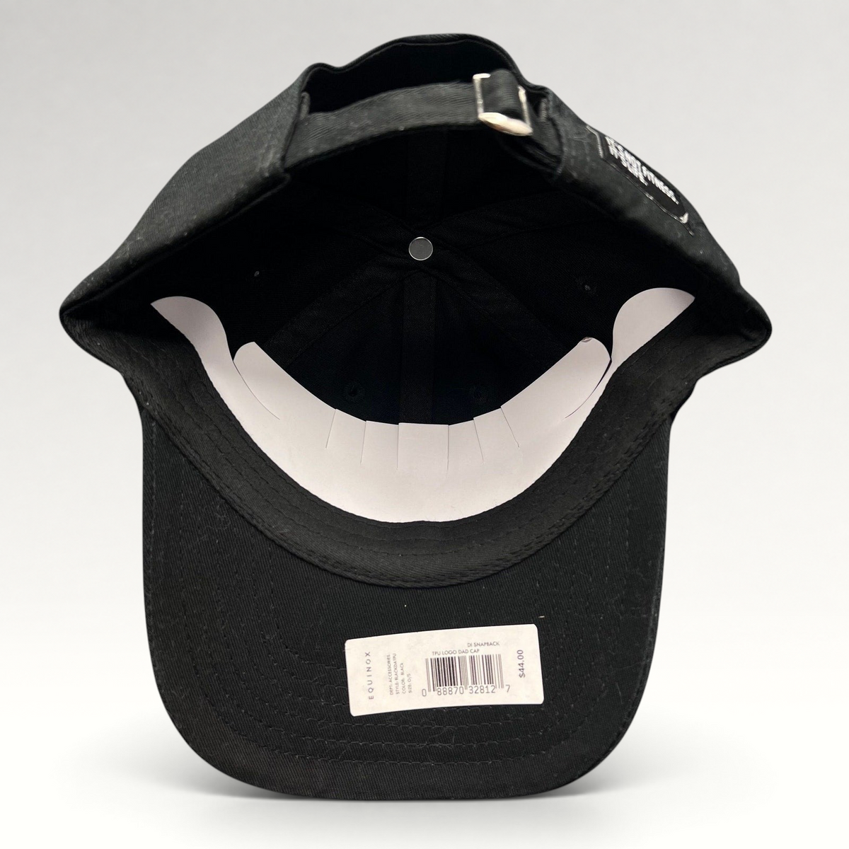 Raree Finds black cotton blend strapback cap with adjustable metal buckle closure, interior view