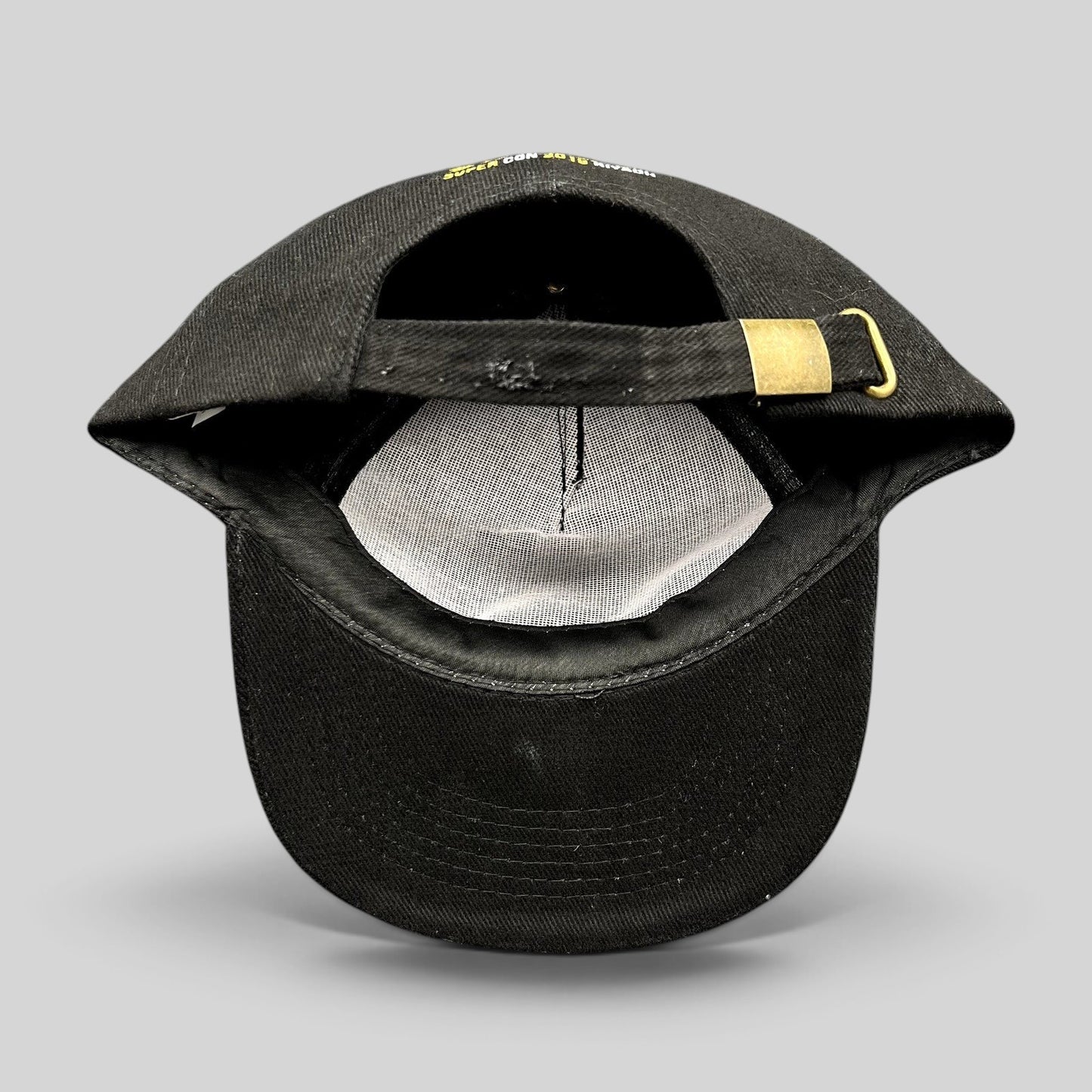 Raree Finds black strapback hat from SuperCon Riyadh 2019 featuring an adjustable brass buckle closure