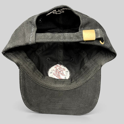 Raree Finds black cotton strapback hat with adjustable brass buckle, showing interior construction and branding.
