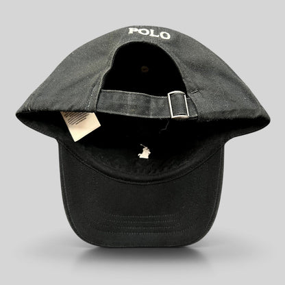 Raree Finds black cotton twill strapback hat with white POLO embroidery and metal buckle on the rear adjustable strap