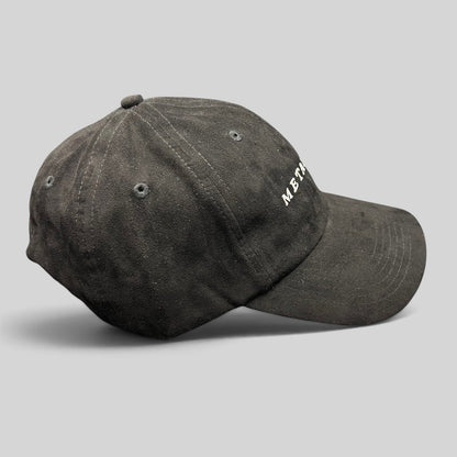 Raree Finds black unstructured strapback hat with white Metal Noir embroidery and a curved brim