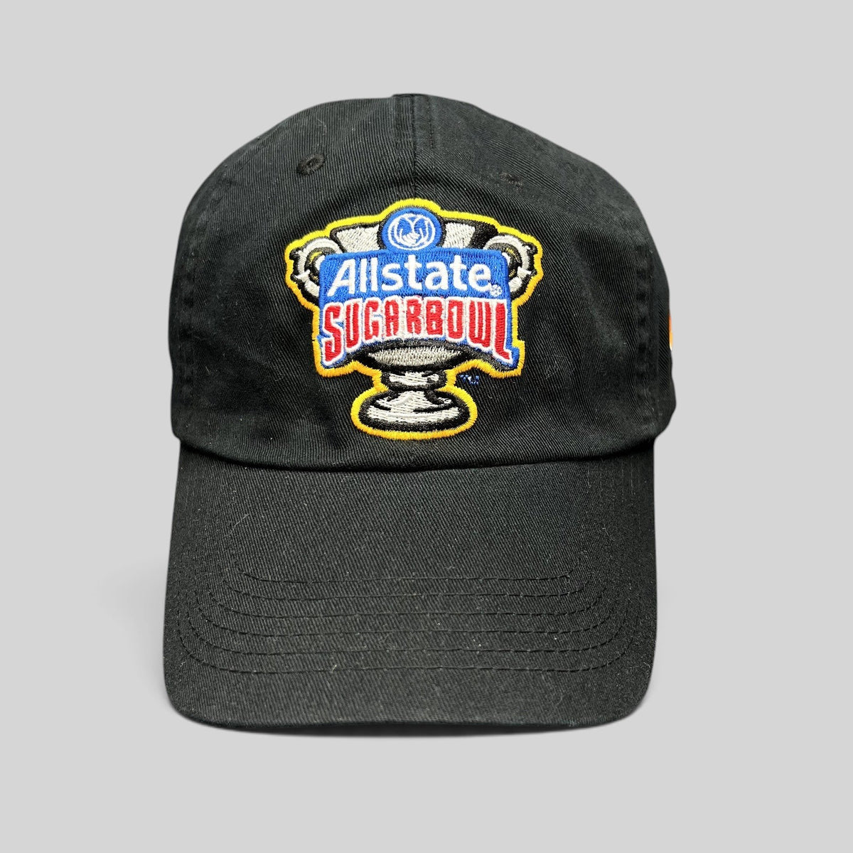 Raree Finds black Bayou Apparel strapback hat featuring an embroidered Allstate Sugar Bowl trophy logo on the front.