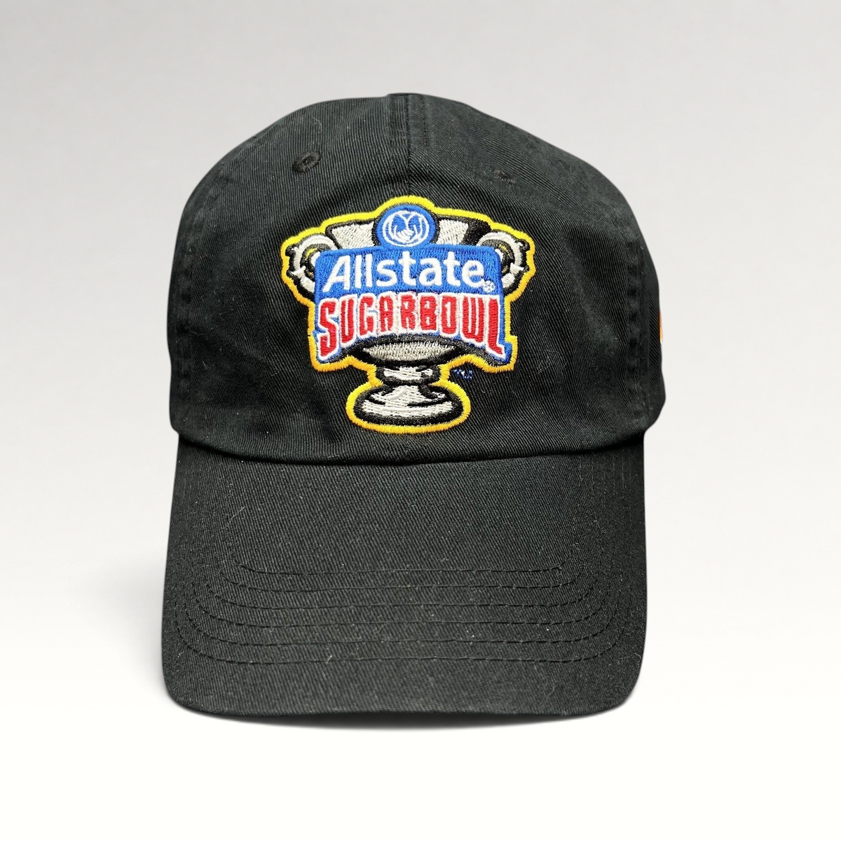 Raree Finds black Bayou Apparel strapback hat featuring an embroidered Allstate Sugar Bowl trophy logo on the front.