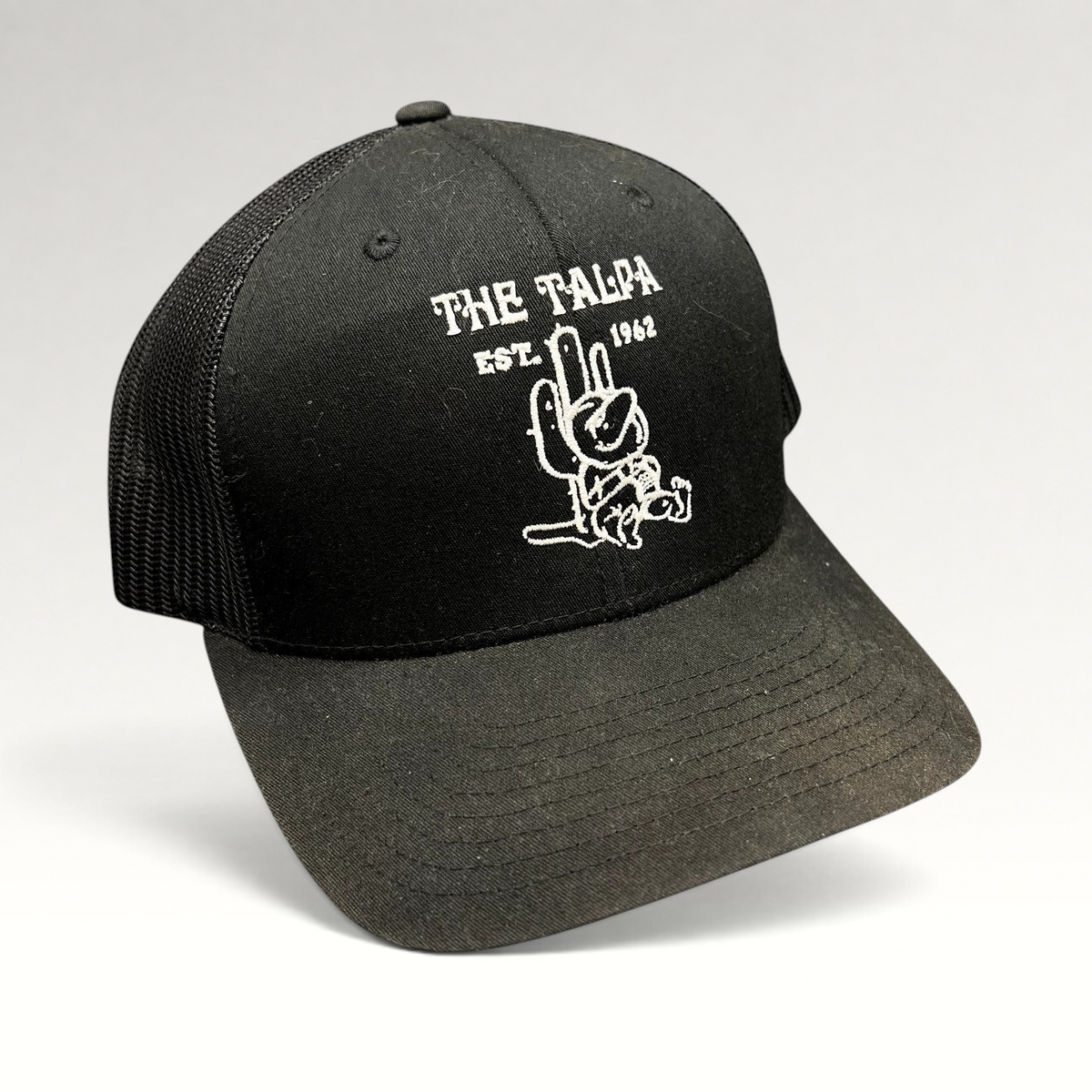 Raree Finds black Yupoong trucker snapback hat with white embroidered The Talpa Est. 1962 cactus mascot logo.
