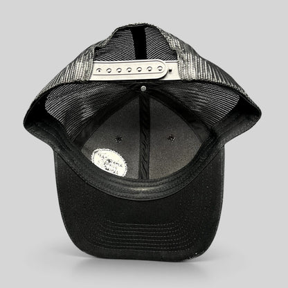 Raree Finds American Music Awards black trucker hat showing the interior mesh lining and adjustable snapback closure.