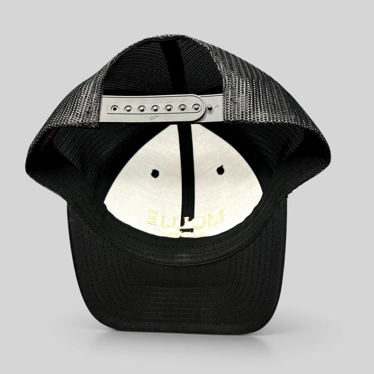 Raree Finds black Yupoong Classics trucker hat with adjustable snapback closure and breathable mesh back panels