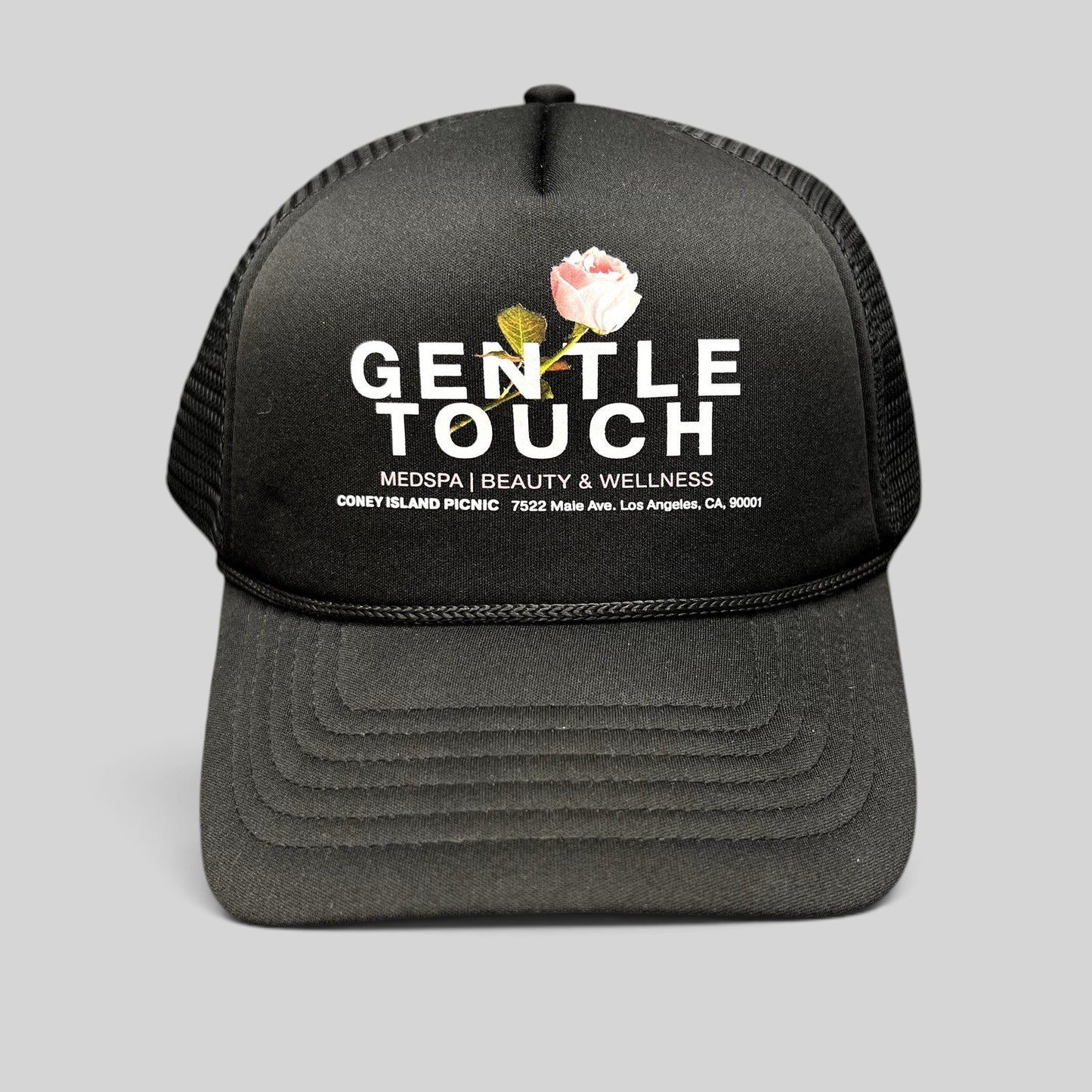 Raree Finds black foam trucker hat with Gentle Touch MedSpa rose graphic and adjustable snapback closure